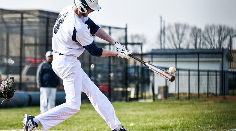 Edgewood’s Ethan McCarty makes contact with the ball during Wednesday’s game against visiting Ross in St. Clair Township. NICK GRAHAM/STAFF