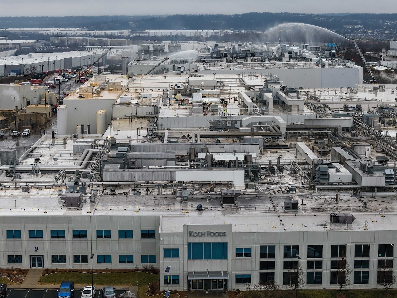 A large industrial fire at Koch Foods Plant B on Commerce Center Drive in Fairfield led to a roof collapse. NICK GRAHAM/STAFF