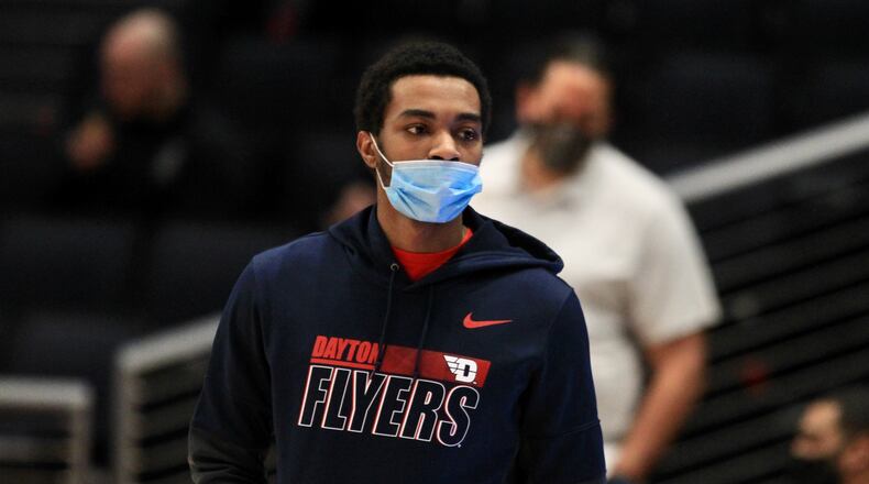 Rodney Chatman watches Dayton warm up before a game against Virginia Commonwealth on Feb. 9, 2021, at UD Arena. David Jablonski/Staff