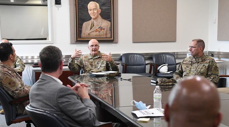 Gen. Arnold W. Bunch Jr. (center), commander, Air Force Materiel Command, initiates a discussion about diversity and inclusion with Arnold Engineering Development Complex senior leadership July 8 at Arnold Air Force Base, Tenn., headquarters of AEDC. Also pictured, Chief Master Sgt. Stanley Cadell (right), command chief, AFMC. Bunch and Cadell also held a diversity and inclusion discussion session with members of AEDC, including uniformed Airmen, Department of Defense civilians and contractors. (U.S. Air Force photo/Jill Pickett)