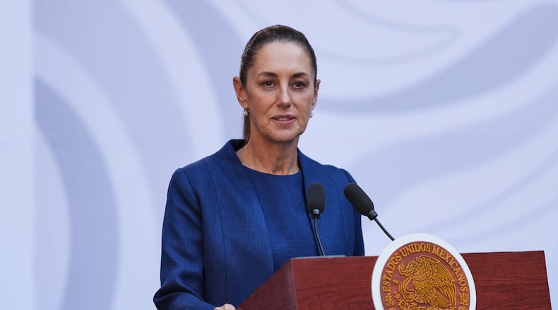 Mexican President Claudia Sheinbaum present a new security strategy against violence for Michoacan state, at the National Palace, in Mexico City, Sunday, Nov. 9, 2025. (AP Photo/Claudia Rosel)