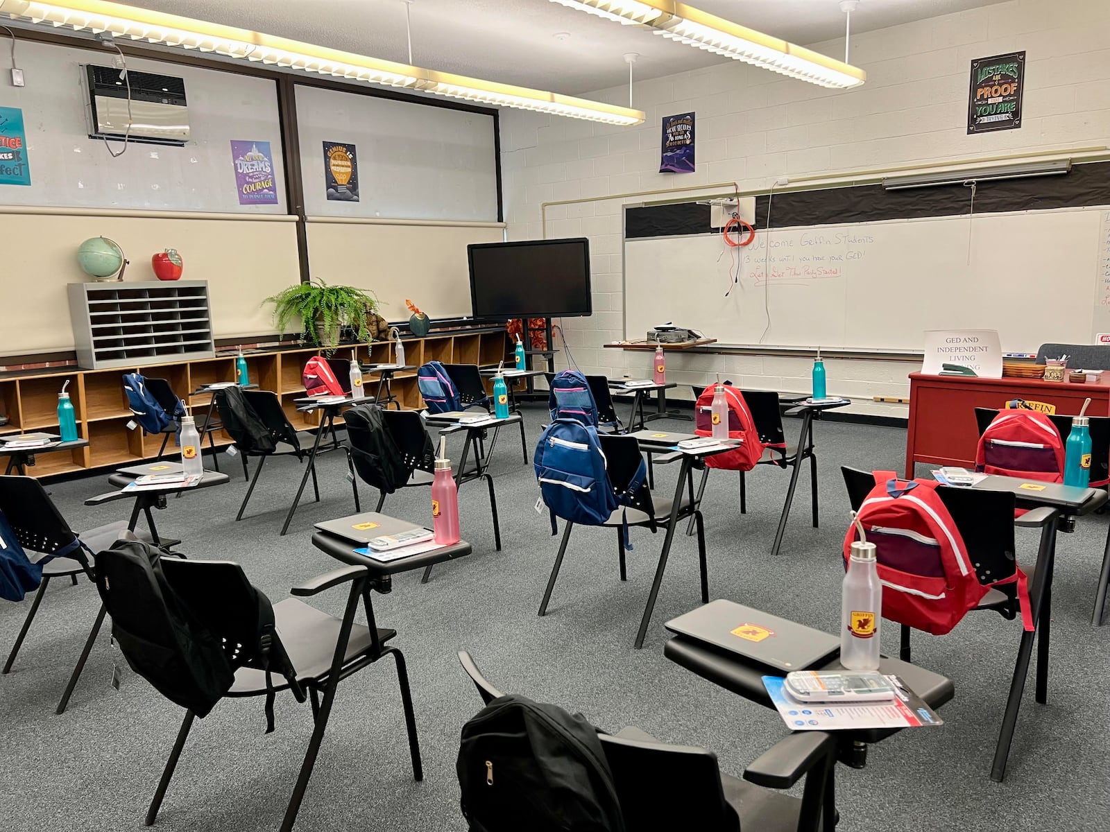 The Griffin Academy building is fully furnished, with a lush library, a stock of specialized tools and workforce development materials, and school supplies arranged atop desks, each with a reusable water bottle bearing the Griffin Academy emblem. AIMEE HANCOCK/STAFF