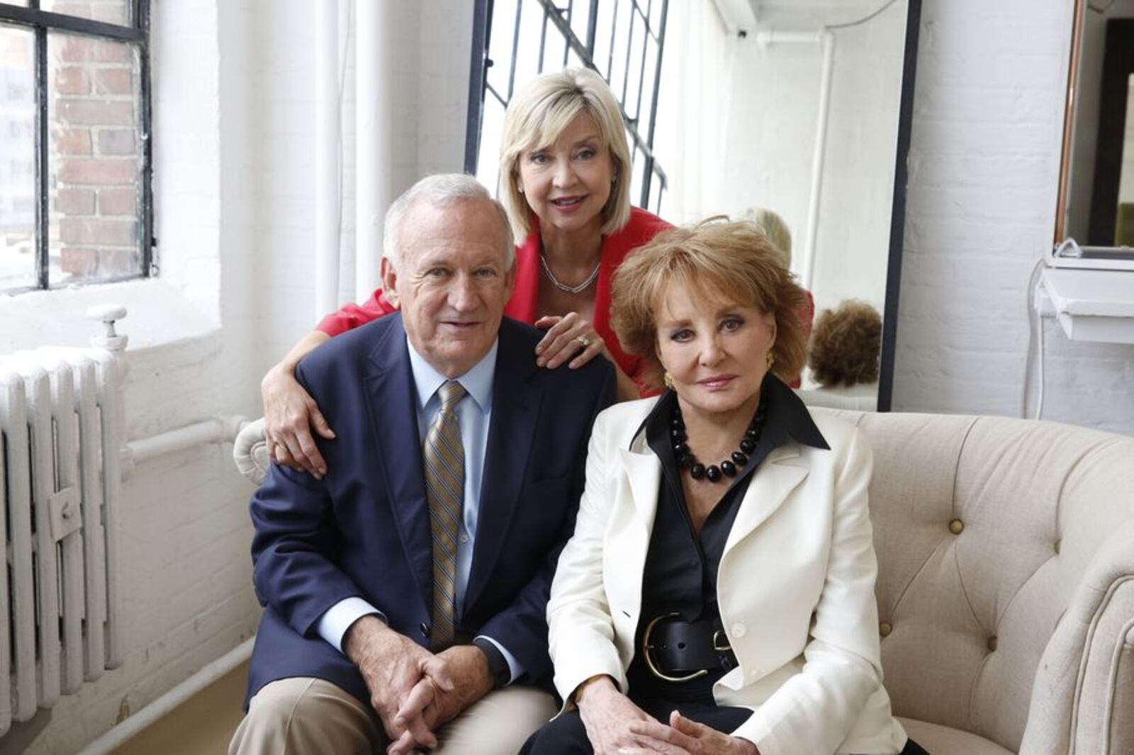 In this image released by ABC, John and Jan Ramsey pose with Barbara Walters, right, for her "American Scandal" series for Discovery.
