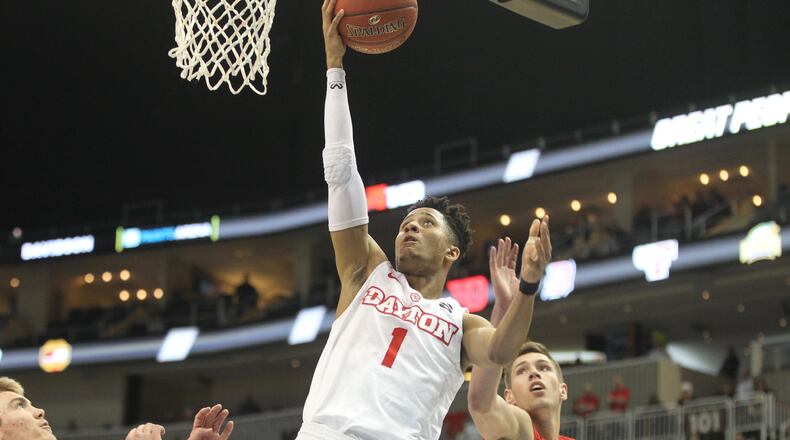 Dayton's Darrell Davis scores against Davidson on March 10, 2017, at PPG Paints Arena in Pittsburgh.