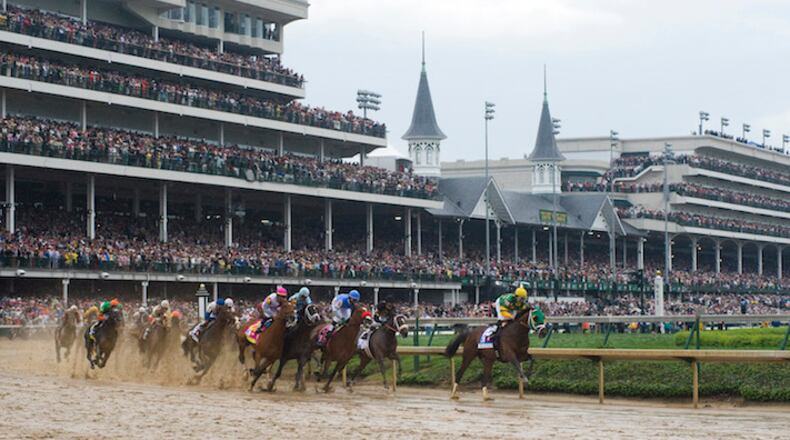 Palace Malice, with Mike Smith up, leads during the first turn of the 139th running of the Kentucky Derby at Churchill Downs in Louisville, Kentucky, on Saturday, May 4, 2013. (Briana Scroggins/Lexington Herald-Leader/TNS)