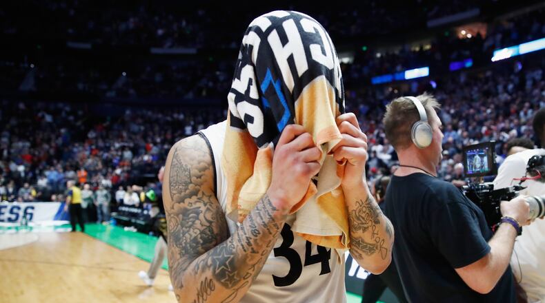 NASHVILLE, TN - MARCH 18: Jarron Cumberland #34 of the Cincinnati Bearcats reacts after falling to the Nevada Wolf Pack during the second half in the second round of the 2018 Men's NCAA Basketball Tournament at Bridgestone Arena on March 18, 2018 in Nashville, Tennessee. (Photo by Andy Lyons/Getty Images)