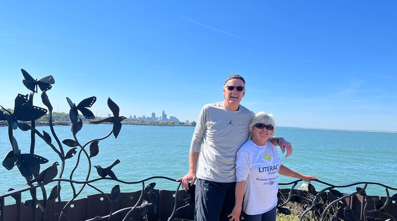 Steve (L) and Barb Hess at a lakeside Metropark in Cleveland. This visit marked their 67th visit to a park since they began their tour in 2018.