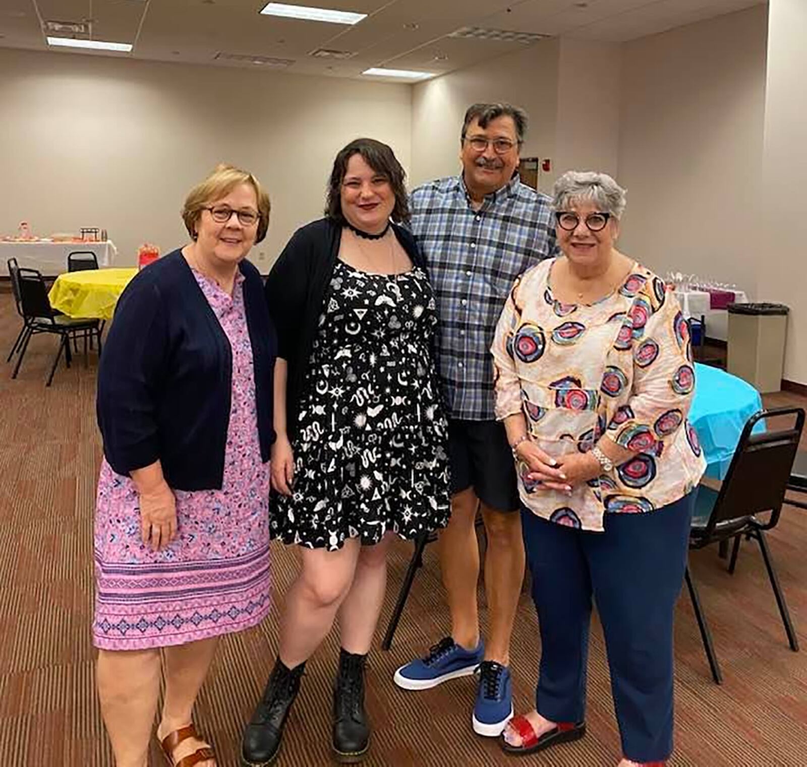 Watson (Right) with her family and close friend at her DPS retirement party in 2021. L-R friend Mary Parker, daughter Rachel, husband Ralph.