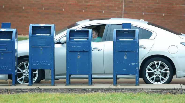 The Beavercreek Police Department is warning residents against using blue mailboxes when mailing items such as cash or checks after receiving reports of thefts from the collections boxes outside U.S. Post Offices. MARSHALL GORBY\STAFF