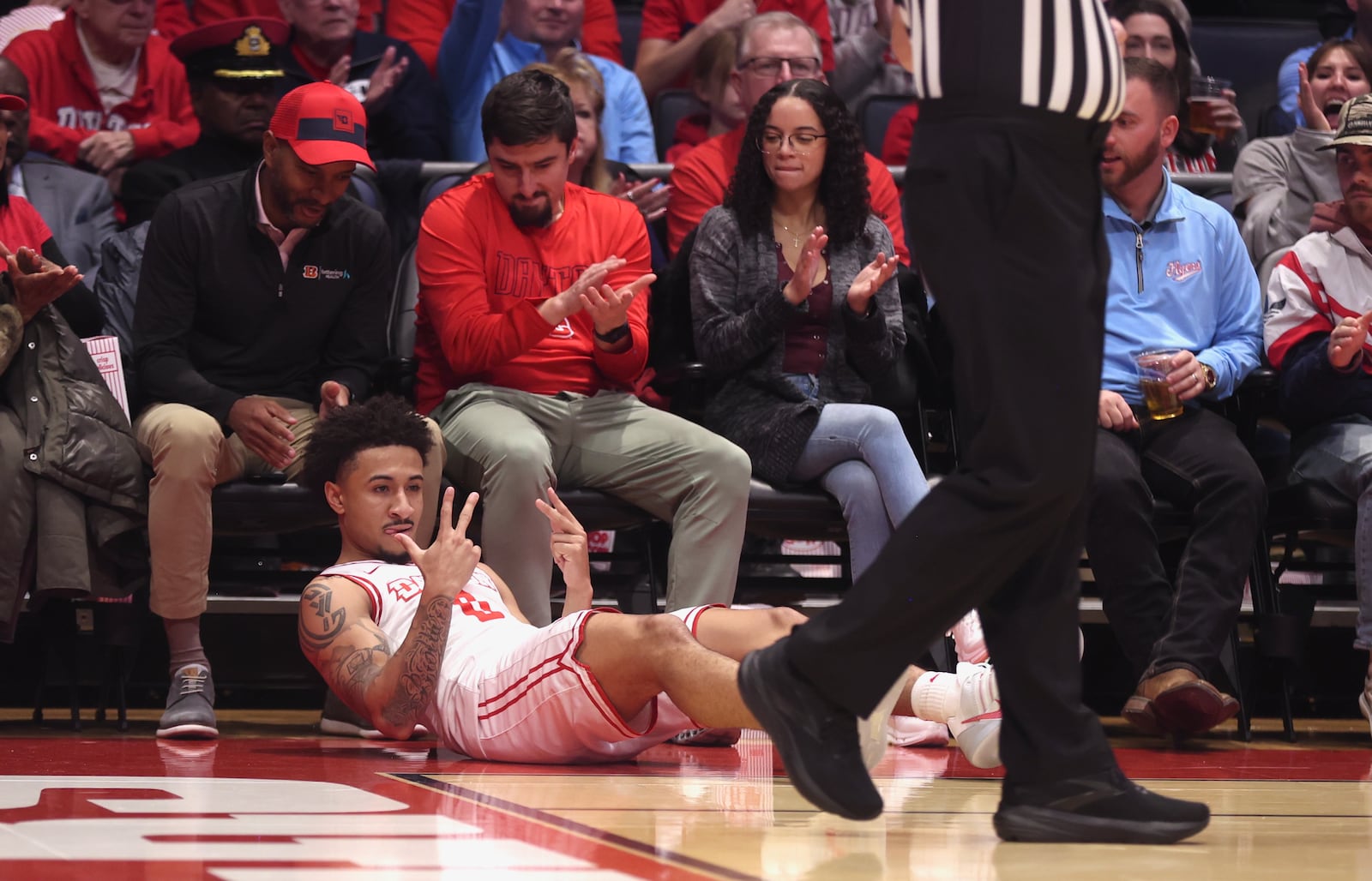 Dayton's Javon Bennett reacts after making a 3-pointer and drawing a foul in the first half against Fordham on Wednesday, Dec. 31, 2025, at UD Arena. David Jablonski/Staff