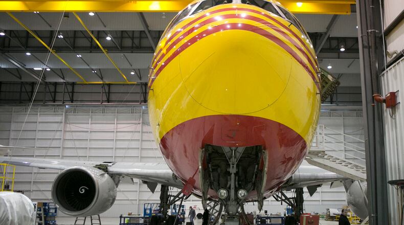 A Boeing 767 painted in DHL livery inside a hangar at the Wilmington Air Park, where ABX Air Inc. and Air Transport International Inc. are based. TY GREENLEES / STAFF