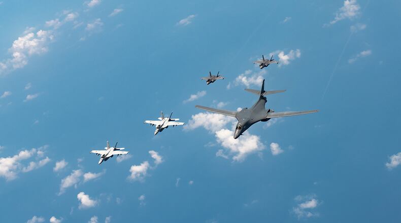 U.S. Navy Carrier Air Wing Five F/A-18 Super Hornets, Marine Corps Marine Fighter Attack Squadron 121 F-35 Lightning IIs, all assigned to Marine Corps Air Station Iwakuni, Japan, and a U.S. Air Force 37th Bomb Squadron B-1B Lancer assigned to Ellsworth Air Force Base, S.D., conduct a large-scale joint and bilateral integration training exercise Aug. 18. (U.S. Air Force photo/Staff Sgt. Peter Reft)
