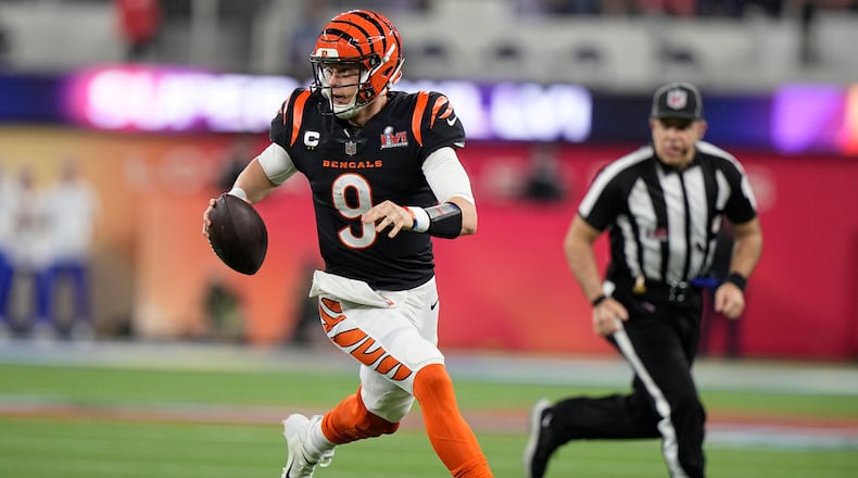 Cincinnati Bengals quarterback Joe Burrow (9) looks to pass against the Los Angeles Rams during the second half of the NFL Super Bowl 56 football game Sunday, Feb. 13, 2022, in Inglewood, Calif. (AP Photo/Lynne Sladky)