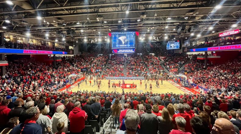 Dayton and Lindenwood stand for the national anthem before their game on Monday, Nov. 7, 2022, at UD Arena. David Jablonski/Staff