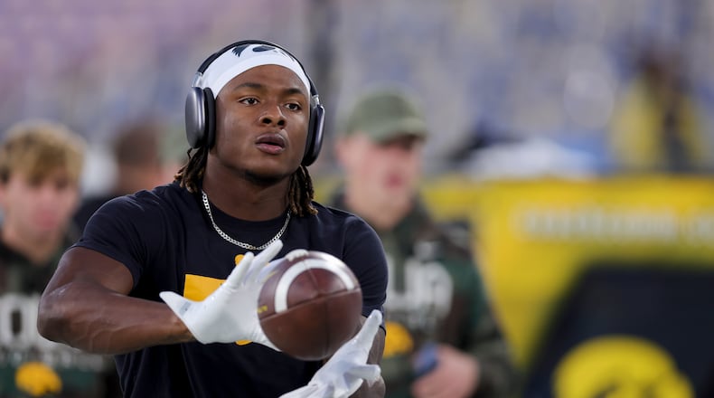 Iowa running back Kaleb Johnson warms up before an NCAA college football game against UCLA, Friday, Nov. 8, 2024, in Pasadena, Calif. (AP Photo/Ryan Sun)