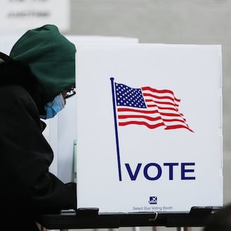 Voters fill out their ballot on Election Day, Tuesday, Nov. 4, 2025, in Detroit. (AP Photo/Paul Sancya)