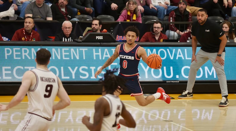 Dayton's Javon Bennett dribbles against Loyola Chicago on Saturday, Jan. 3, 2026, at Gentile Arena. David Jablonski/Staff