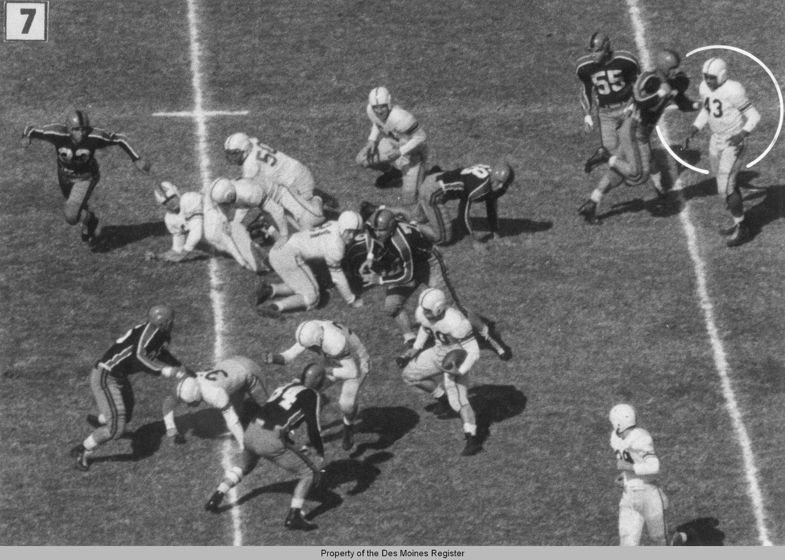 The premeditated, racially-motivated, jaw-breaking punch Oklahoma A & M defensive lineman Wilbanks Smith delivered on defenseless Drake quarterback Johnny Bright – an assault that happened away from the action after Bright had handed the ball to his running back in the October 20, 1951 game in Stillwater, Oklahoma – was captured on film (as were two other cheap shot hits on Bright that knocked him unconscious) by Des Moines Register photographers John Robinson and Doug Ultang. A six-photo sequence of the assaults ran across the top of the Des Moines sports page the next day and was picked up and run in newspapers across the nation as well as being featured in Life and Look magazines. Robinson and Ultang won the Pulitzer Prize in 1952 for their photos.  JOHN ROBINSON AND DOUG ULTANG / DES MOINES REGISTER AND DRAKE UNIVERSITY