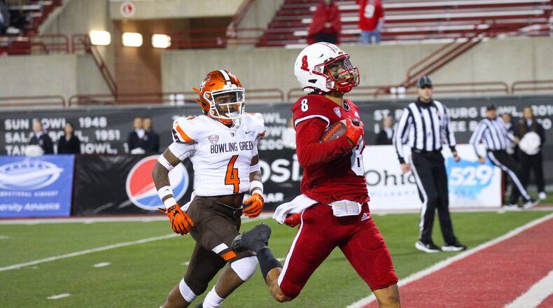 Miami wide receiver Mac Hippenhammer crosses the goal line ahead of Bowling Green's Deshawn Jones Jr. during Tuesday night's game at Yager Stadium. Miami Athletics photo