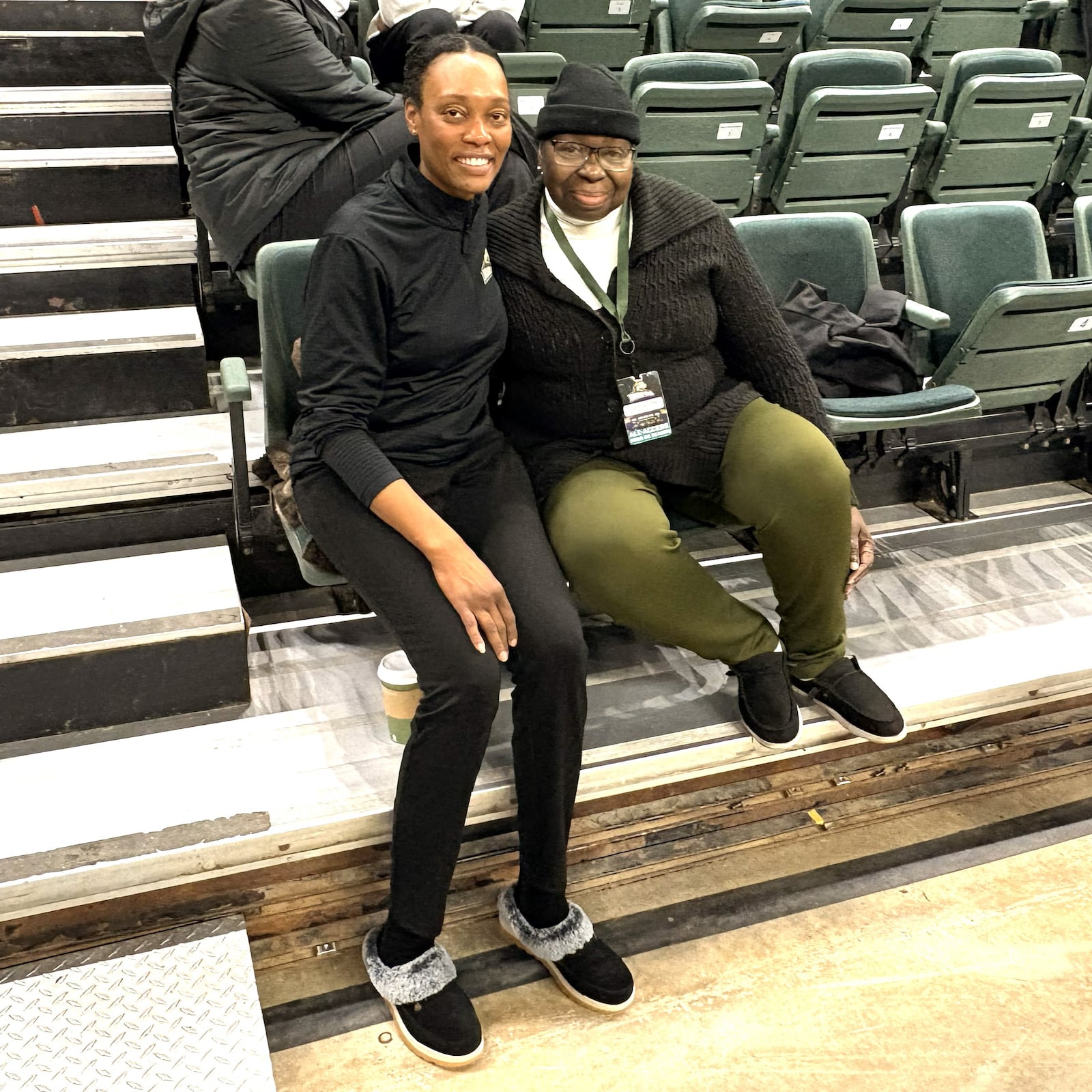 At a recent Wright State men’s basketball game, athletic trainer LaShaunta' Jones slipped over to the stands right behind the Raiders’ bench to check on her mom, Darlene, who is a popular presence with everyone  at the Nutter Center, from the WSU ballplayers and coaches to administrators, players’ parents and the fans. TOM ARCHDEACON / CONTRIBUTED PHOTO
