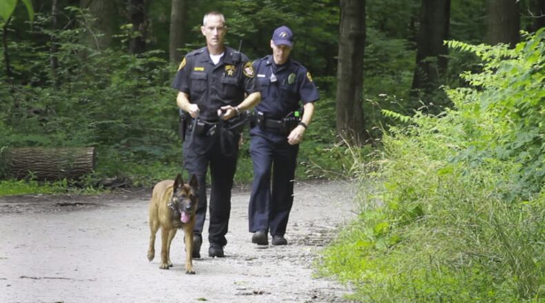 The Greene County Sheriff's office and other area law enforcement respond to the report of a man with a gun wearing camouflage at the Glen Helen Nature Preserve. The report at approximately 11:30 a.m. Thursday, prompted staff at Glen Helen's Outdoor Education Center to move children participating in summer Ecocamps to a secure location and staff at Antioch College locked down the campus at about 12:30 p.m. Greene County Sheriff’s deputies and Yellow Springs Police officers are still searching for the man.
