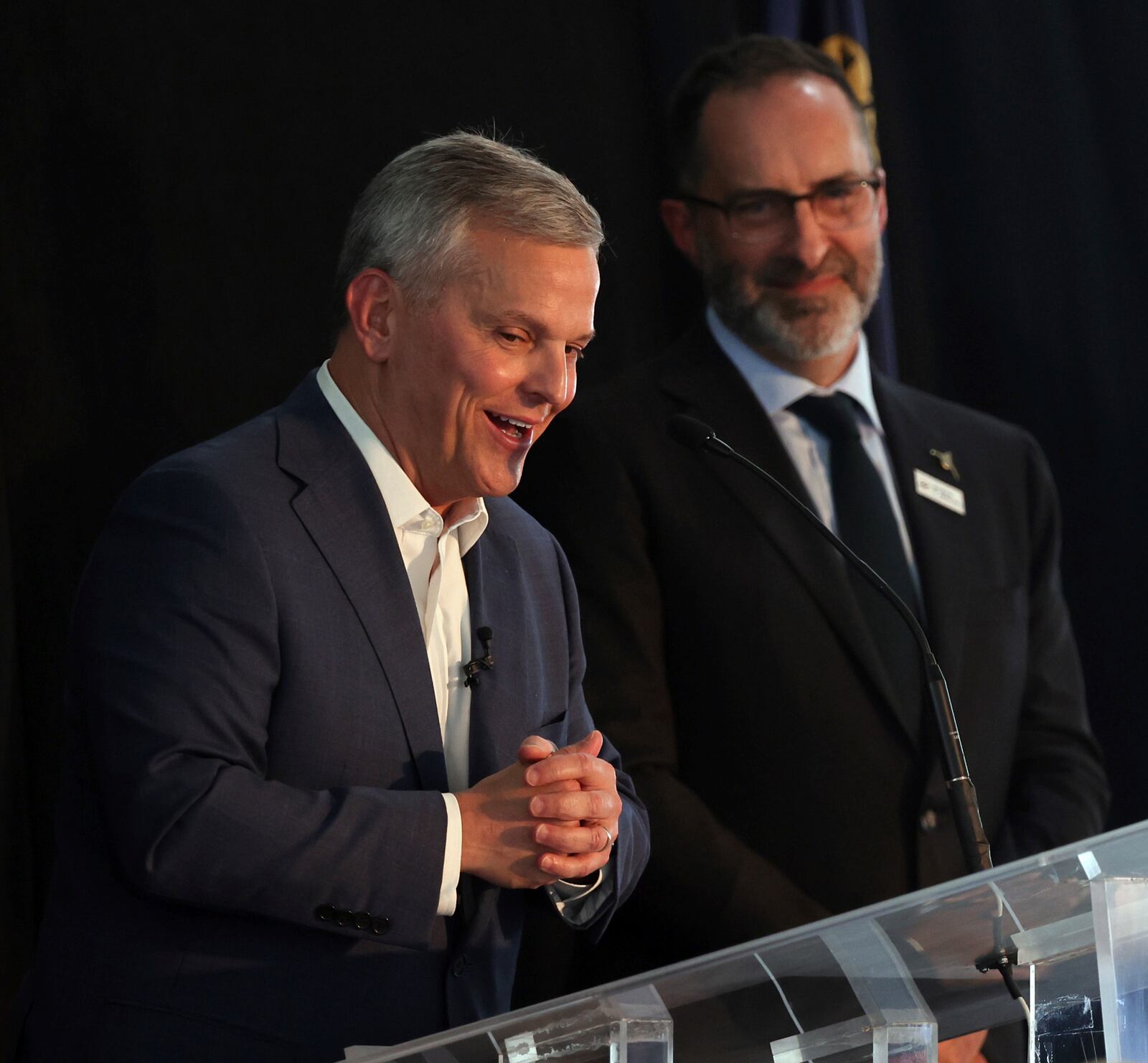 North Carolina governor Josh Stein (left) and JetZero CEO and co-founder Tom O'Leary speak during a ceremony on Thursday, June 12, 2025, announcing that the company will build its manufacturing facility for its future Z4 passenger jet at Piedmont Triad International Airport in Greensboro, N.C. (Walt Unks/The Winston-Salem Journal via AP)