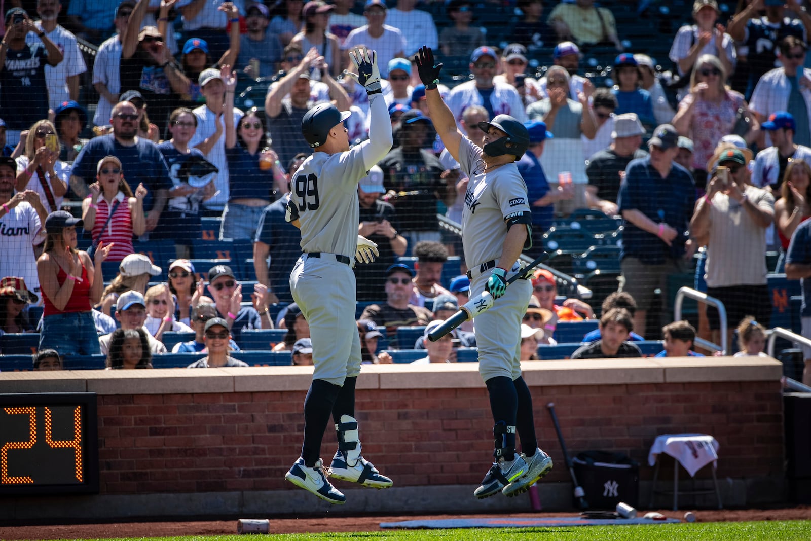 New York Yankees' Aaron Judge (99) celebrates his home run during a baseball game against the New York Mets, Friday, July 4, 2025, in New York. (AP Photo/Angelina Katsanis)
