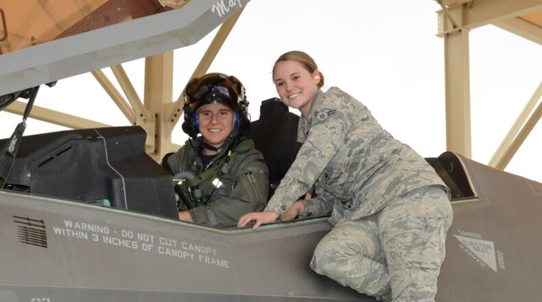 Maj. Rachael Winiecki, 461st Flight Test Squadron F-35 test pilot, and Airman 1st Class Heather Rice, 412th Aircraft Maintenance Squadron crew chief, pose for a photo right after Winiecki landed her F-35 Lightning II on her first test mission flight in the fifth-generation fighter Dec. 14, 2018. (U.S. Air Force photo by Kenji Thuloweit)