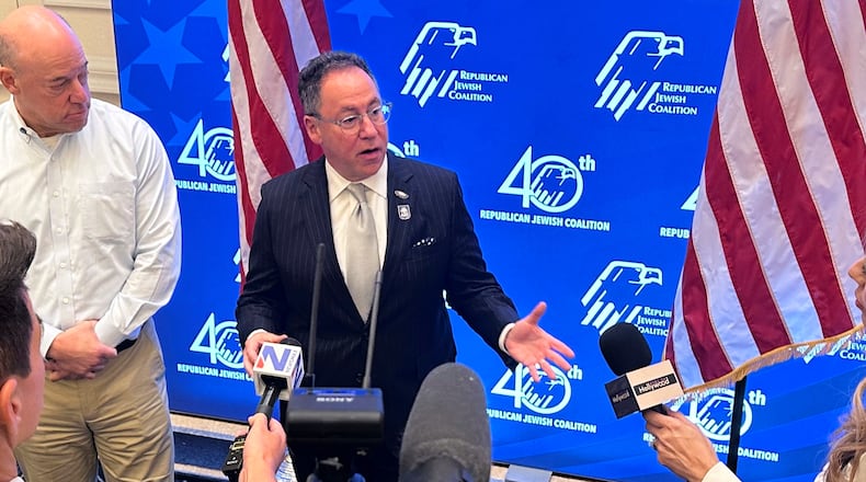 Republican Jewish Coalition CEO Matt Brooks, center, alongside Ari Fleischer, an RJC board member and press secretary to former President George W. Bush, answers questions from members of the news media about confronting antisemitism within the Republican Party, during the coalition's annual conference at the Venetian Resort in Las Vegas, Saturday, Nov. 1, 2025. (AP/Thomas Beaumont)