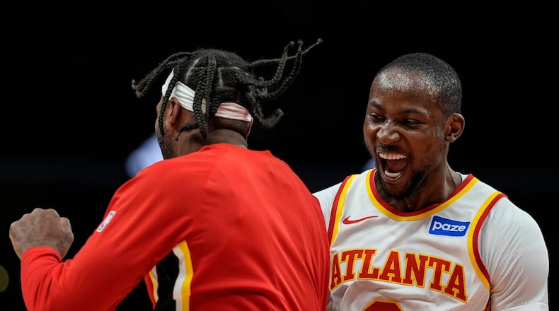 Atlanta Hawks forward Jonathan Kuminga (0) celebrates his basket against the Portland Trail Blazers during the second half of an NBA basketball game, Sunday, March 1, 2026, in Atlanta. (AP Photo/Mike Stewart)