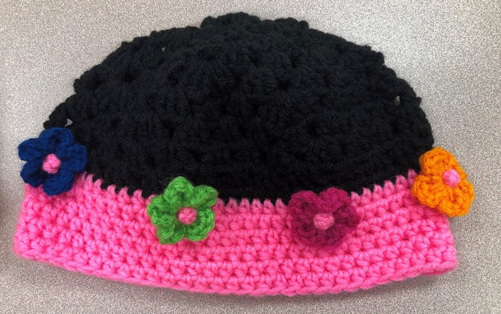 Stitches of Love provides handmade hats to local organizations. CONTRIBUTED