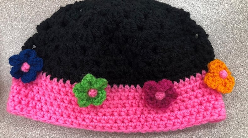 Stitches of Love provides handmade hats to local organizations. CONTRIBUTED