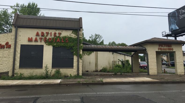 The Gem City Market will be built on the 300 and 400 block of Salem Ave., supporters announced Wednesday. The building in the photo will undergo a feasibility study and might be torn down. STAFF/CORNELIUS FROLIK