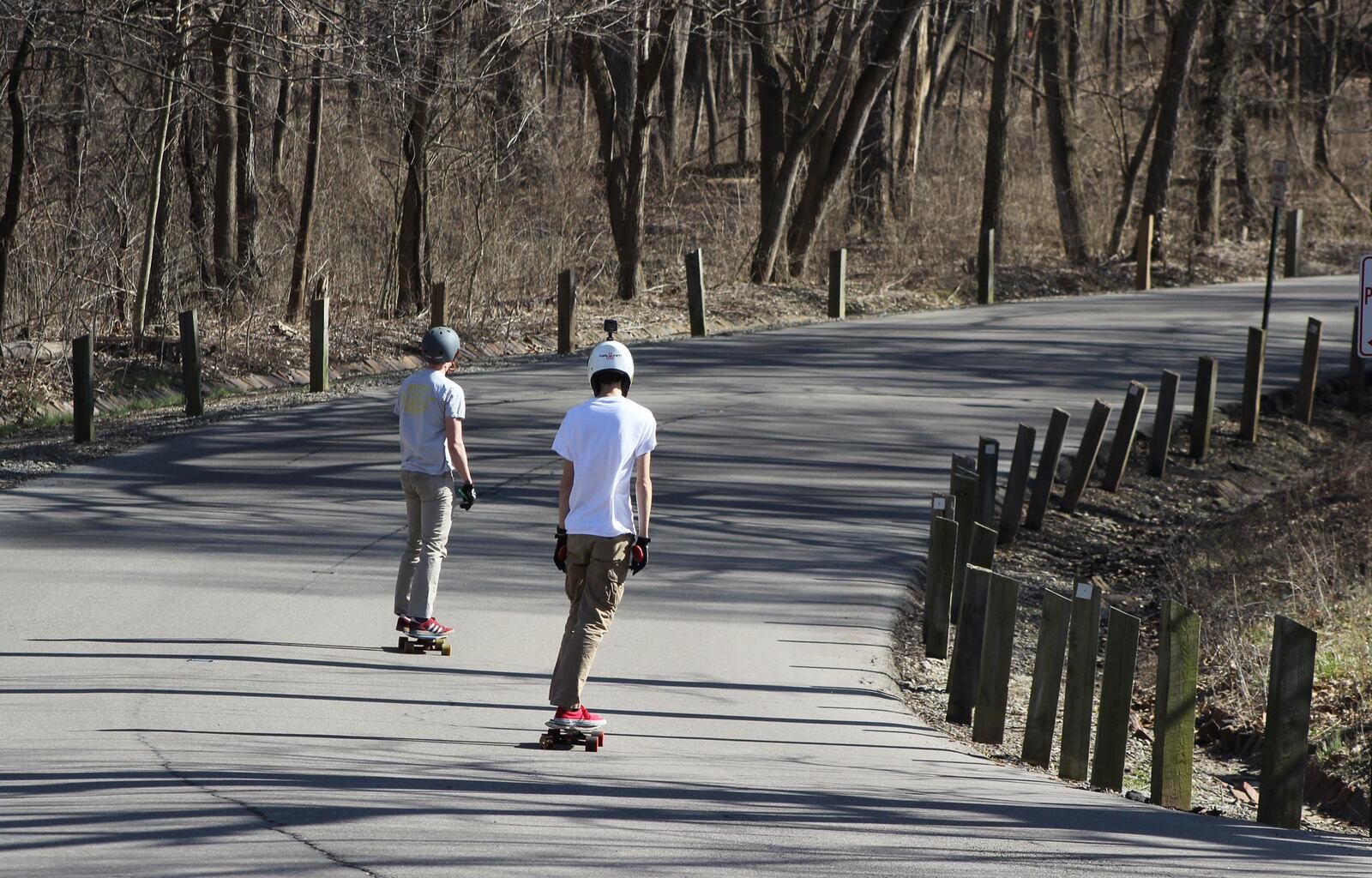 Boys enjoy some skateboarding along Patterson Road in Kettering.