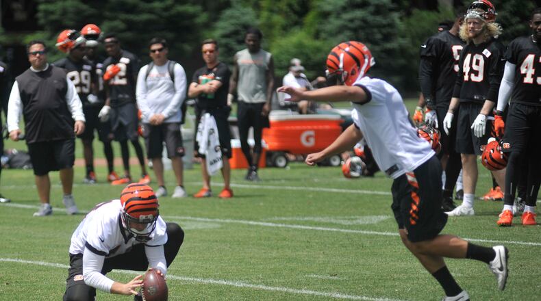 Cincinnati Bengals rookie kicker Jake Elliott attempts a field goal during an OTA practice May 30, at Paul Brown Stadium. JAY MORRISON/STAFF