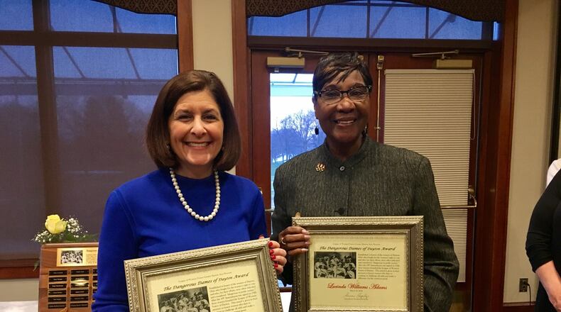 Debbie Feldman, president and chief executive of Dayton Children’s Hospital, and Lucinda Williams Adams, an Olympic gold medalist and retired Dayton Public Schools teacher and administrator, received the Dangerous Dames of Dayton award on Thursday from The League of Women Voters of the Greater Dayton Area. LYNN HULSEY/Staff