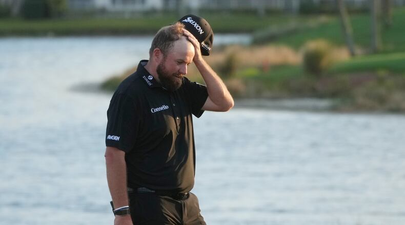 Shane Lowry of Ireland walks off the 18th green during the final round of the Cognizant Classic golf tournament, Sunday, March 1, 2026, in Palm Beach Gardens, Fla. (AP Photo/Marta Lavandier)