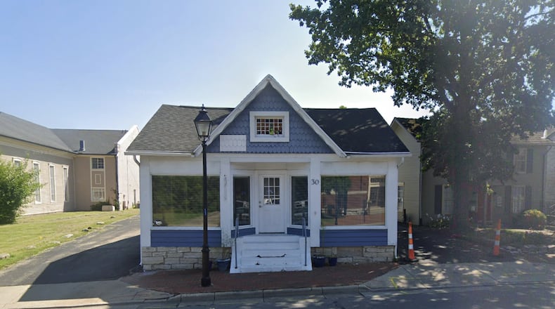 Centerville is adjusting Uptown property lines at 30 N. Main St., taking ownership of a parking lot and redefining a storefront parcel for future leasing or sale. The site was formerly home to Craig's Barber Shop. CONTRIBUTED