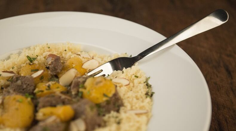 Moroccan Lamb with Apricots, Almonds & Mint. (Ryan Michalesko/St. Louis Post-Dispatch/TNS)