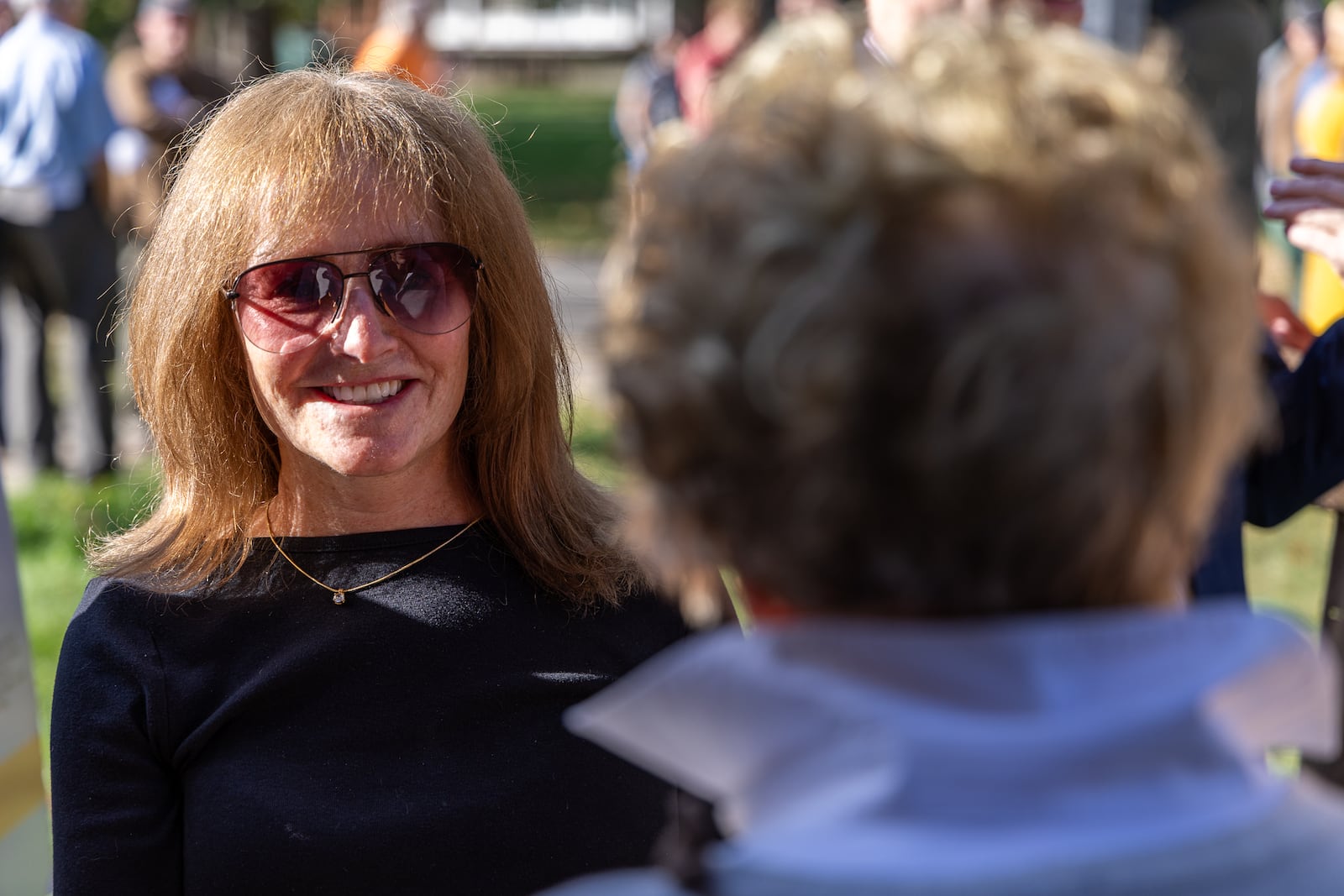Anne Serling talks with an attendee during a dedication ceremony for a historical marker for Rod Serling on the campus of Antioch College on Thursday, Oct. 2 in Yellow Springs. Anne Serling is Rod's daughter and has written a book about her father, the creator of "The Twilight Zone." BRYANT BILLING / STAFF