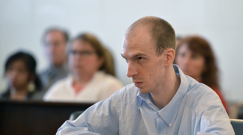 Ryan Dillon stands trial in Clark County Common Pleas Court on Monday, accused of killing his mother and fleeing in a stolen truck to Wisconsin nearly two years ago. Bill Lackey/Staff