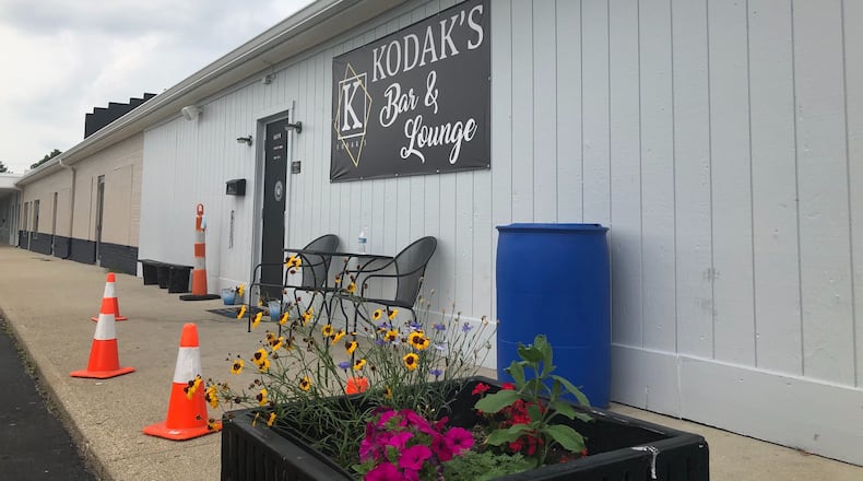 A Huber Heights mother, Sophfronia Puckett-Lattimore, has opened Kodak's Bar & Lounge in Huber Heights to leave a legacy for her adult children. MARK FISHER/STAFF