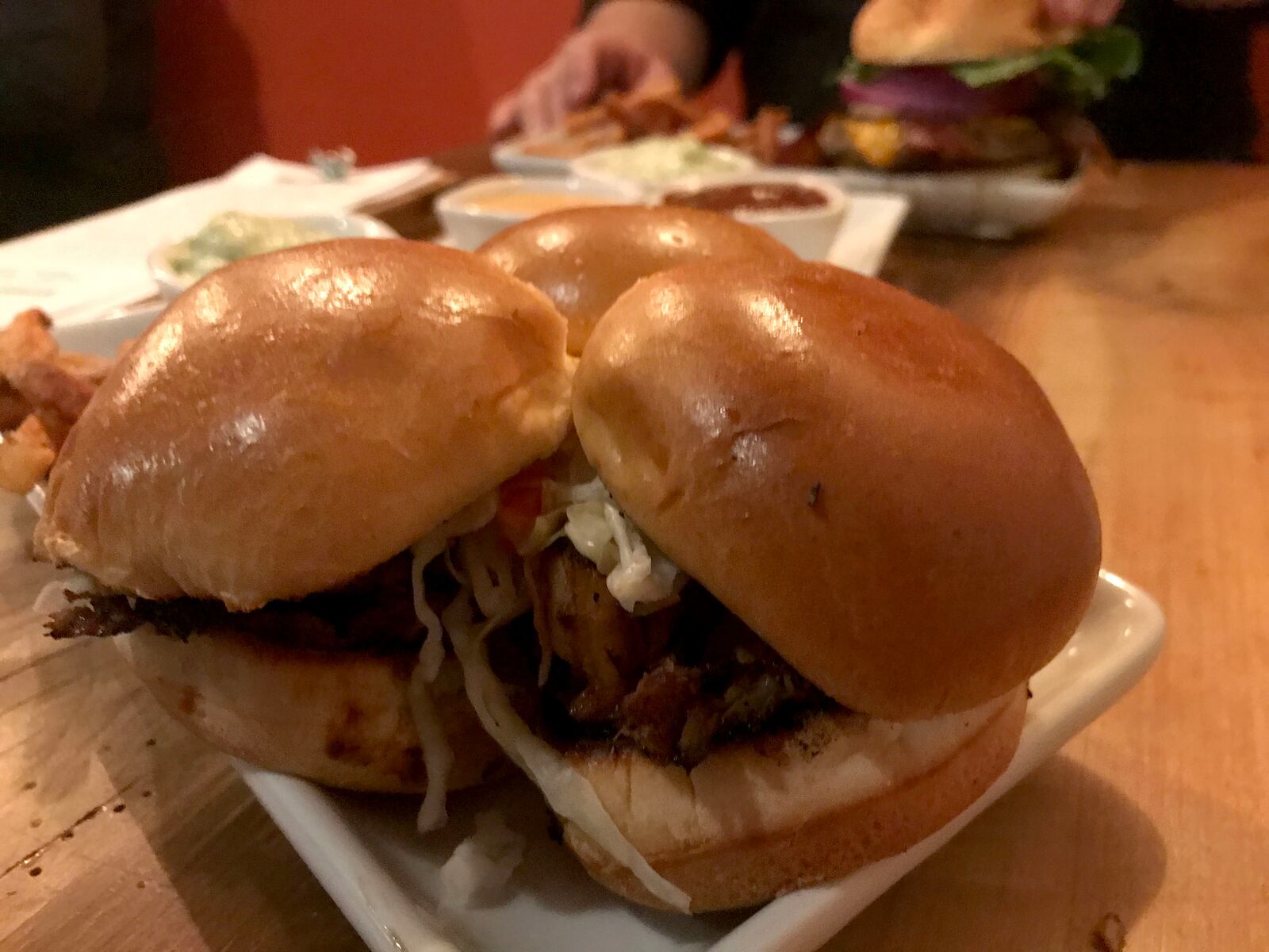 The food at Lock 27 in downtown Dayton.  Pictured: Lock 27's Asian Pork Sliders served with French fries. Photo by Amelia Robinson