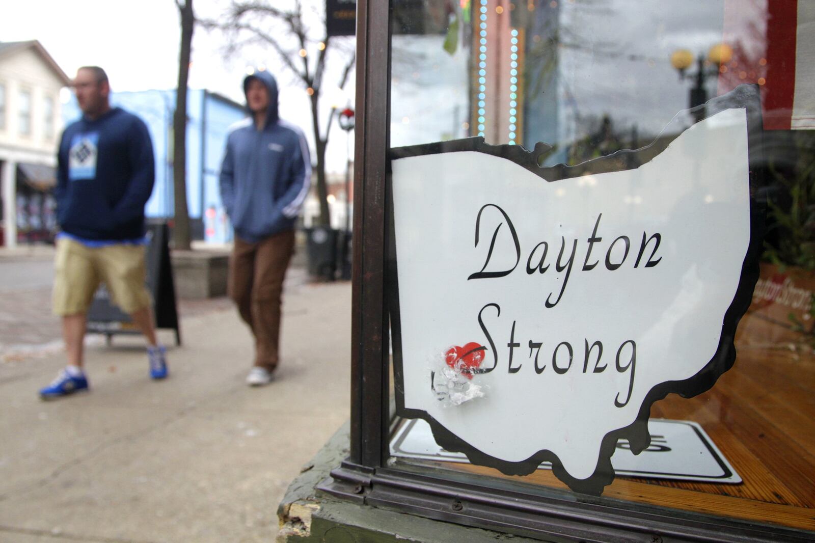 Uplifting messages are posted throughout Dayton’s Oregon District five months after the Aug. 4 mass shooting. LISA POWELL / STAFF