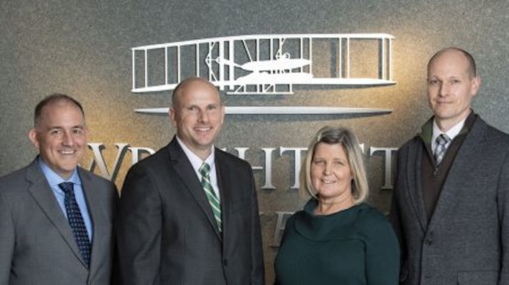 Wright State’s Center for Civics, Culture and Workforce Development staff members Adam Reiman, deputy director; Jason Anderson, executive director; Diane Vitas; and Mike Jacobs, deputy director. Courtesy of Wright State University.