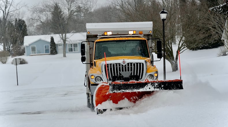 City of Springfield snow plows were out early Friday morning February 4, 2022 clearing roads like this one on Andover Drive.