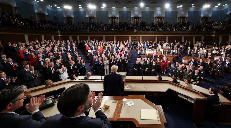 Members of the Congress give a standing ovation as President Donald Trump delivers the State of the Union address to a joint session of Congress in the House chamber at the U.S. Capitol in Washington, Tuesday, Feb. 24, 2026. (Jessica Koscielniak/Pool Photo via AP)