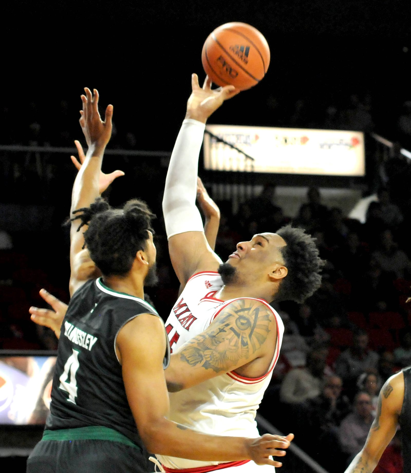 Miami's Anderson Mirambeaux, 45, shoots over Eastern Michigan's Jalin Billingsley, 4, during the first half of a Mid-American Conference game at Millette Hall on Saturday, Jan. 28, 2023. DAVID A. MOODIE/CONTRIBUTING PHOTOGRAPHER