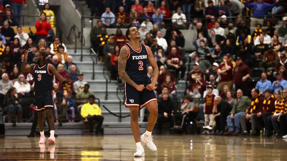 Dayton's De'Shayne Montgomery celebrates after a defensive stop against Loyola Chicago on Saturday, Jan. 3, 2026, at Gentile Arena. David Jablonski/Staff
