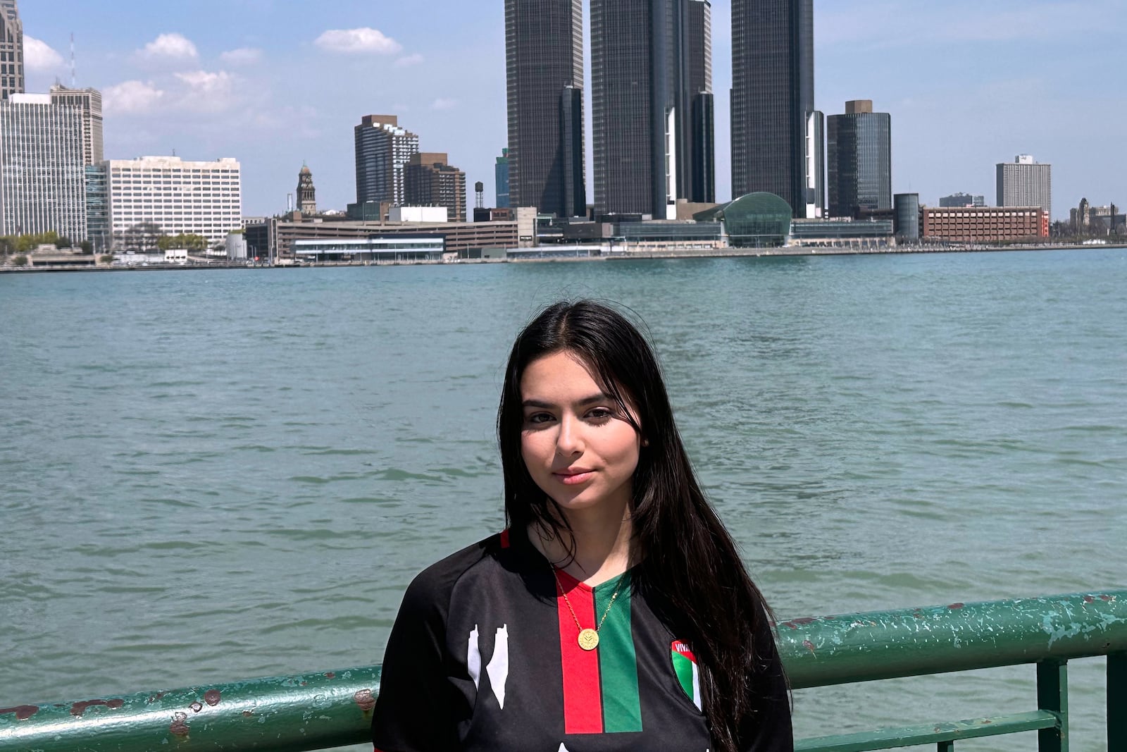 Yara Alfaqeeh, 20, stands along the Windsor, Ontario, Canada side of the Detroit River on Wednesday, April 23, 2025. (AP Photo/Corey R. Williams)